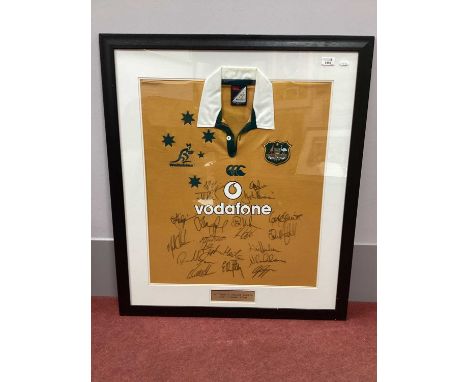 Australia Rugby Union 2004 Touring team signed home shirt framed, featuring twenty signitures, frame size 94 x 81cm.
