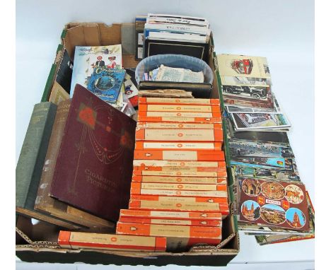 Ephemera to include a selection of postcards many of popular holiday destinations, a folder full of written on postcards, var