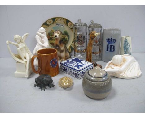 Seated pottery ballerina, two glass German steins with pewter lids, two other tankards, a Michel Roux studio pottery lidded p