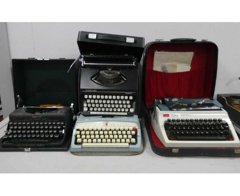 Cased typewriters to include silver-reed silverette, Imperial Model T, Daro Erika and Brother De Luxe. (4)