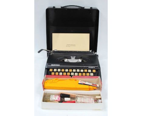 Vintage Silver Reed 'Silverette' Cased Portable Typewriter, with operating instructions and Emgee typist's cleaning outfit. (