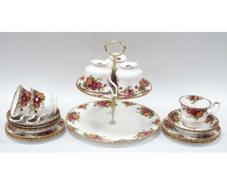 Royal Albert 'Old Country Roses', six side plates, tea cups and saucers, all first quality, plus cake stand.