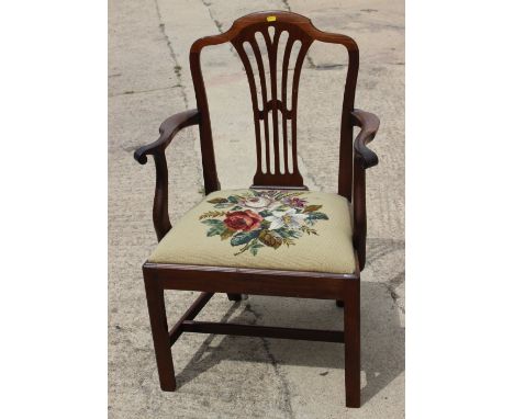 A Hepplewhite design carver chair with wheatsheaf back and drop-in needlepoint seat