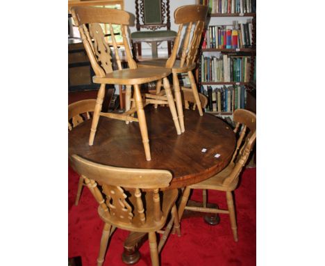 A set of six splat back kitchen chairs with panel seats