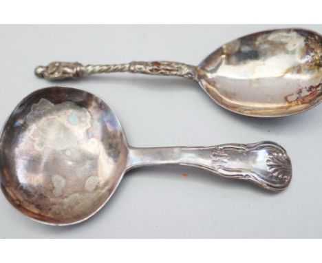 A Georgian silver caddy spoon and one other adapted from an Apostle spoon, 1oz troy approx