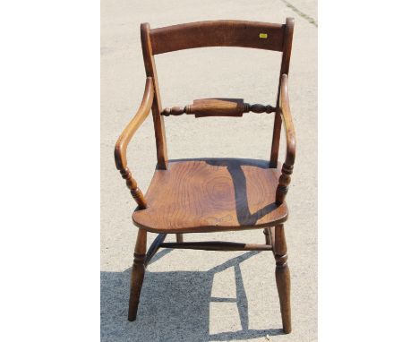 A 19th century Oxford bar back elbow chair with elm panel seat