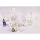 A pair of modernist glass candlesticks, a Wedgwood glass candlestick, a number of glass swans and