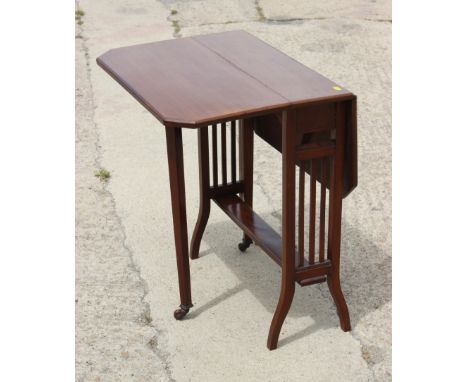 An Edwardian mahogany Sutherland two-tier table, on pierced panel end supports, 24" wide