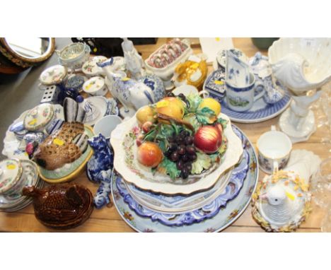A quantity of blue and white china, including collectors plates, ceramic boxes and other items