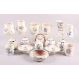 Two pairs of 1950s Poole vases, six Poole preserve pots and covers and other 1950s Poole