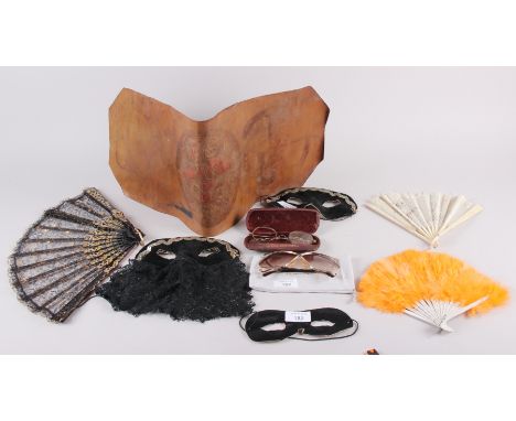 A Venetian carnival mask, three fans, a pair of sunglasses, marked Christian Dior, and other items