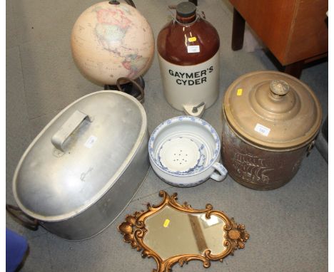 An aluminium fish kettle, a brass coal bin, a globe lamp, a gilt framed mirror and a Gaymers Cyder stoneware flagon