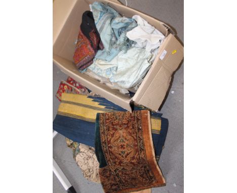 An ermine wrap, a pair of leather breeches, a bead embroidered panel and other items of costume including an embroidered Rege