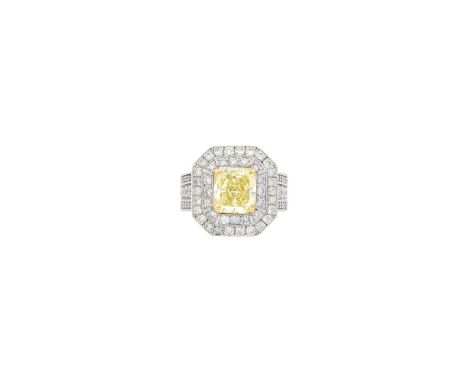One cut-cornered rectangular modified brillilant Fancy Light Yellow diamond weighing 3.76 cts., 84 round diamonds ap. 1.60 ct