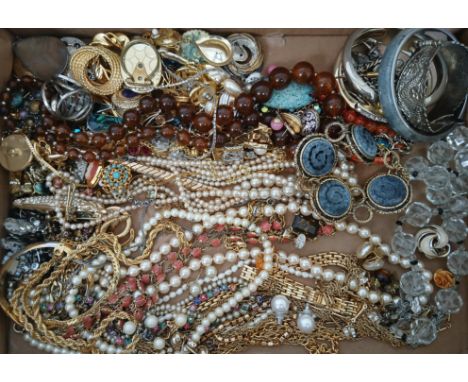 A tray of assorted vintage costume jewellery.  