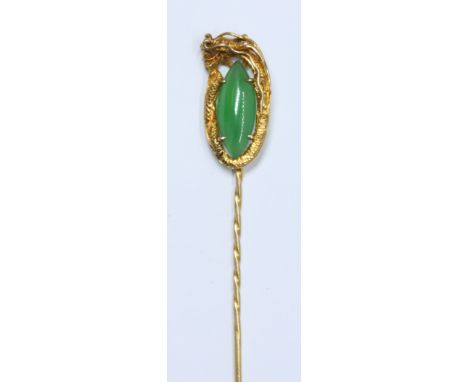 An eastern stick pin modelled as a dragon surrounding a marquis shaped jadeite jade cabochon, probably Chinese Hong Kong, mak