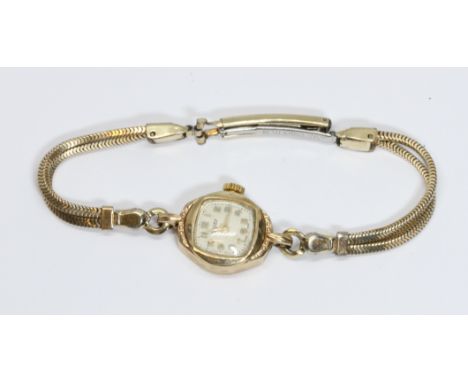 A ladies 9ct gold Rotary wristwatch, gold plated strap.  