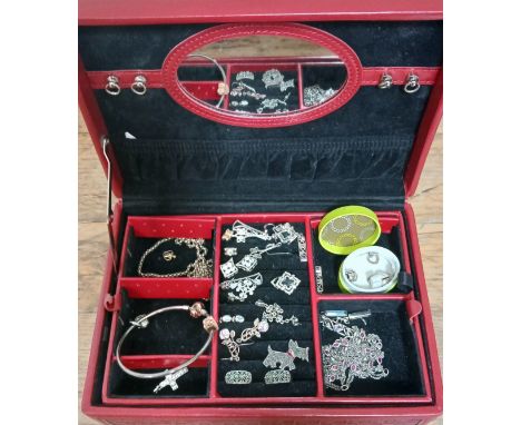 A red leather jewellery box containing mainly 925 jewellery including Mackintosh, a vintage scotty dog brooch etc.  