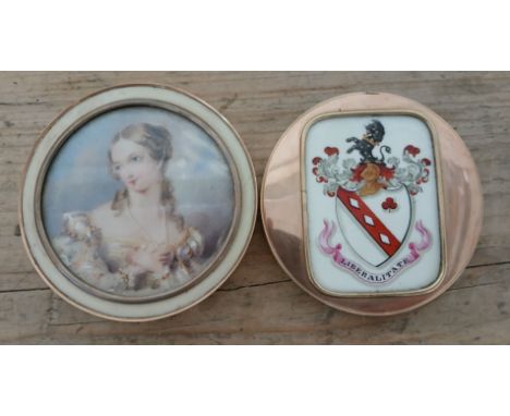 A 19th century ivory veneered and yellow metal snuff box of circular form, the top with portrait miniature depicting a young 
