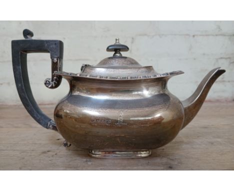 A hallmarked silver teapot, length 27cm, gross weight 18.6ozt.  