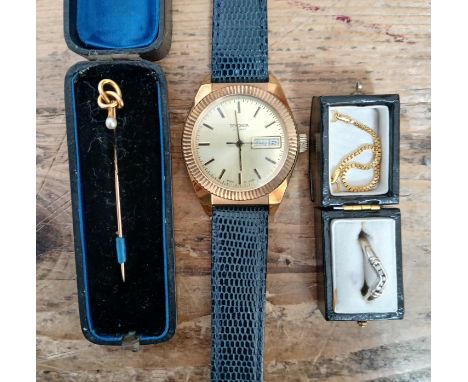 A mixed lot comprising a 9ct gold diamond ring, weight 1.8g, a yellow metal stick pin, weight 1.5g, and a gold plated Sekonda