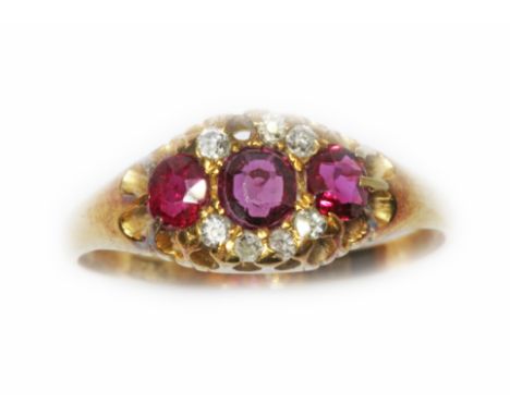 An antique ruby and diamond ring, three oval rubies set between single cut diamonds, hallmarked 18ct gold, sponsor 'B&amp;S',