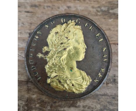A Louis XV accession medal 1715, signed ny Roettier &amp; Mauger, bronze &amp; gilt, from 'Historie metallique du roy' series