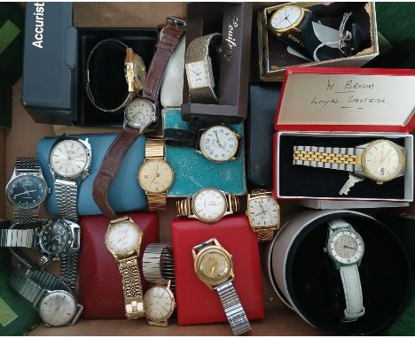 A box of assorted mainly vintage mechanical watches.