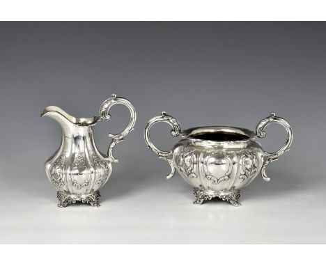 A Victorian silver twin handled sugar basin and cream jug Samuel Hayne &amp; Dudley Cater, London 1848, of squat lobed melon 