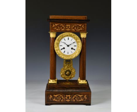 A mid-19th century rosewood, ormolu and marquetry portico clock the Japy Frères movement no. 709, with bell strike on the hou