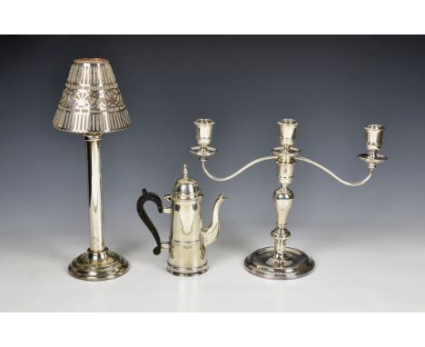 An Elizabeth II silver three light candelabra Charles S. Green & Co. Ltd., Birm. 1972, 10in. (25.5cm.) high, gross weight 22.