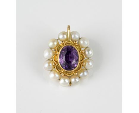 A Victorian style yellow gold, amethyst and pearl pendant the double sided pendant with a central oval cut amethyst within a 