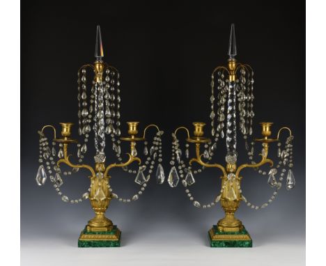 A pair of neo-classical style ormolu, cut glass and malachite two light candelabra possibly Russian, early 20th century, the 