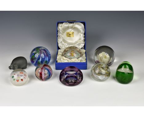 A small collection of glass paperweights comprising Caithness Fiesta, Honesty and golfer; boxed Strathearn Glass millefiori a