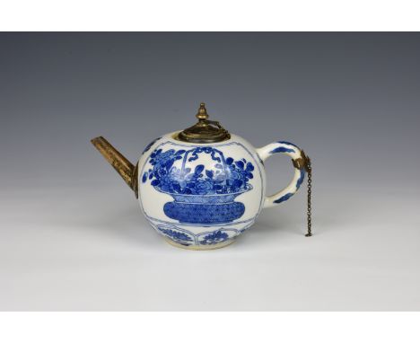 A Chinese porcelain blue and white teapot 18th century, with white metal mounts, the globular body painted with auspicious ob