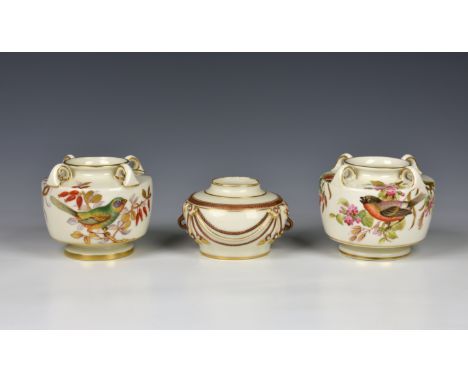 A pair of 19th century Royal Worcester four handled porcelain vases c. 1855, of squat form, handpainted decoration of a bullf