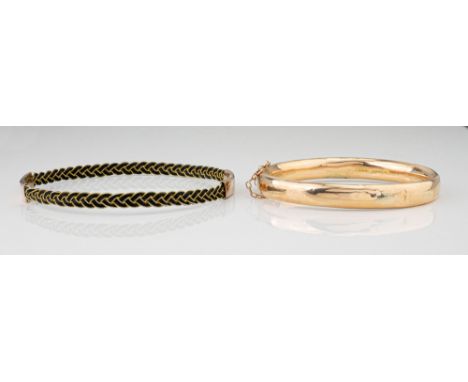 A Victorian 9ct gold and elephant hair braided bangle with 9ct rose gold clasp; together with a 9ct rose gold hollow, hinged 