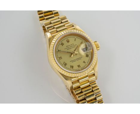 A ladies 18ct gold Rolex Oyster Perpetual Datejust wrist watch Ref. 69178, c.1987, 19mm. champagne dial signed 'Rolex Oyster 