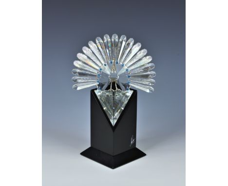 A limited edition Swarovski Peacock Ref. No: 218123, with framed certificate of authenticity, 1998, stating "We hereby certif