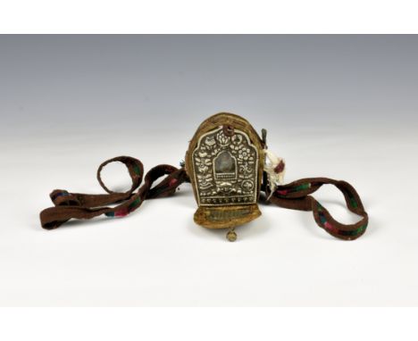 A Tibetan Gau Ghau (prayer box) portable shrine, the case in nice golden embroidered silk, opening to reveal the white metal 
