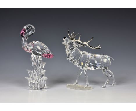 Two Swarovski crystal models boxed, comprising "Rare Encounters Stag" with metal antlers and "Flamingo". (2) *Condition: Boxe