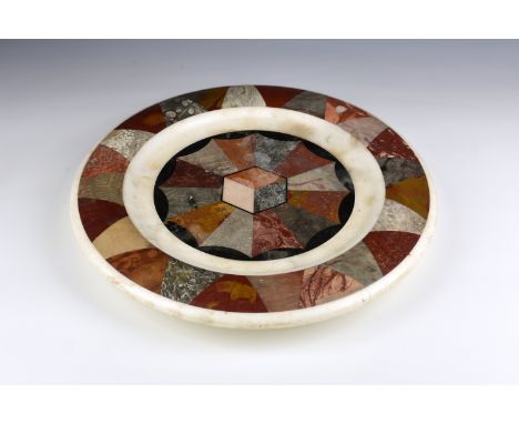 A 19th century Grand Tour specimen marble circular dish inlaid with a central cube and fan of specimen marbles on a black and