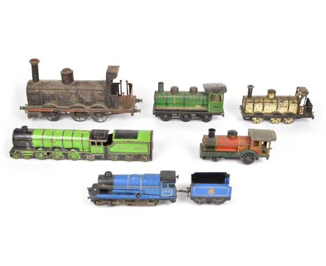 Collection of six wind up clockwork tinplate locomotives to include a novelty lime green tin Flying Scotsman on wheels, Chad 