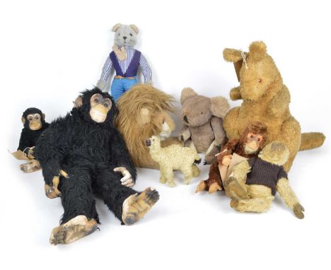 Nine plush stuffed animal teddy bears to include a kangaroo with pouch, Merrythought seated lion, a wire constructed llama, H