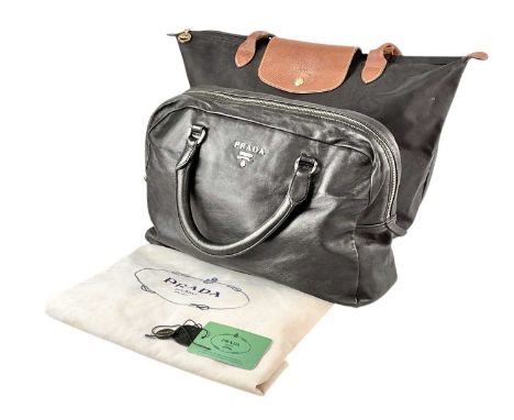 PRADA - A Vela Nero B8888 black leather handbag. With silver tone hardware,35cm, with label and dust bag; together with a LON