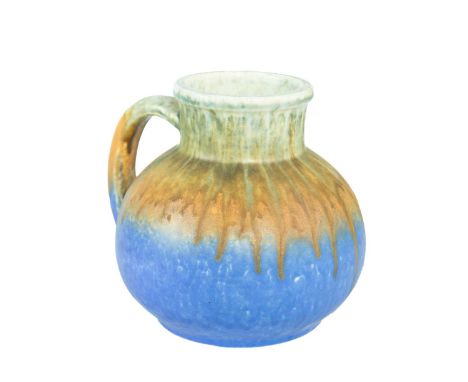 A Ruskin Pottery crystalline glaze single-handled vase. Dated 1933 within the triangular impressed marks to the base, height 