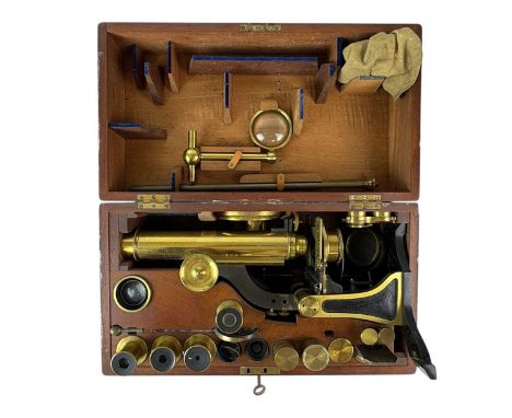 A compound monocular microscope by H Crouch, 54, London Wall, London, 334. Circa 1870, signed on the tube, with rack and pini