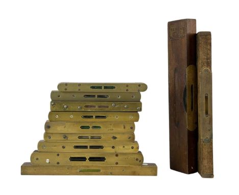 A collection of wood and brass spirit levels. Various makers, including F.R. Low PTY LTD Sydney and Wilson Lovatt and Sons, W