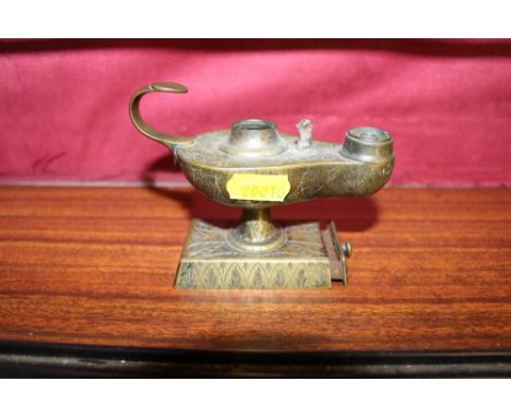 An unusual cigar table lighter with Vesta drawer in the form of a lamp