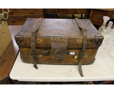 A large brown travelling trunk